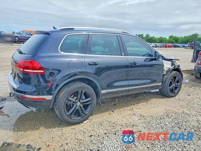 Trzecie zdjęcie samochodu z tyłu: 2017 VOLKSWAGEN TOUAREG WOLFSBURG VIN:WVGRF7BP3HD004584 - miniatura