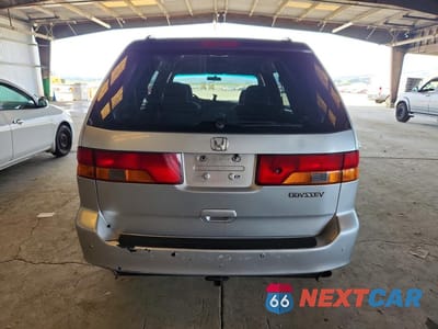 Zdjęcie 6 z 13 samochodu: 2004 HONDA ODYSSEY EX VIN:5FNRL18874B112008 - miniatura