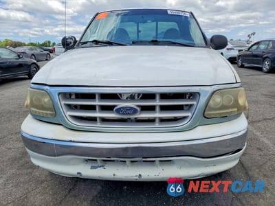 Piąte zdjęcie samochodu w środku: 2000 FORD F150 VIN:1FTRX07W3YKB00221 - miniatura