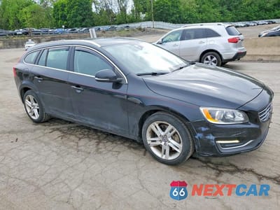 Czwarte zdjęcie samochodu z boku: 2015 VOLVO V60 PREMIER VIN:YV1612SK0F1222407 - miniatura