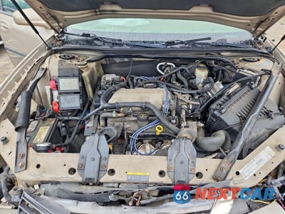 Zdjęcie 11 z 12 samochodu: 2002 CHEVROLET IMPALA VIN:2G1WF55E529291011 - miniatura