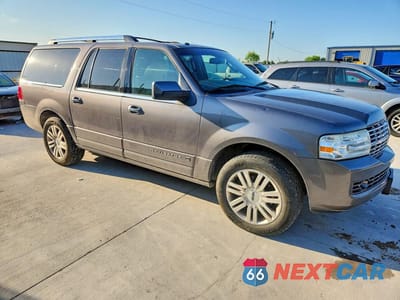 Czwarte zdjęcie samochodu z boku: 2012 LINCOLN NAVIGATOR L VIN:5LMJJ3J52CEL06842 - miniatura