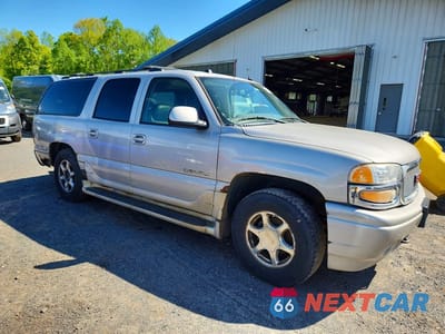 Czwarte zdjęcie samochodu z boku: 2005 GMC YUKON XL DENALI VIN:1GKFK66U55J266752 - miniatura