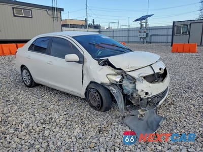 Czwarte zdjęcie samochodu z boku: 2009 TOYOTA YARIS BASE VIN:JTDBT903494049691 - miniatura