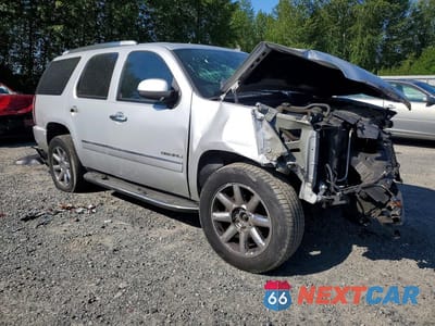 Czwarte zdjęcie samochodu z boku: 2010 GMC YUKON DENALI VIN:1GKUKEEF7AR136164 - miniatura