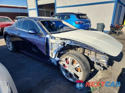 Czwarte zdjęcie samochodu z boku: 2009 MASERATI GRANTURISMO S VIN:ZAMHL45A990047989 - miniatura
