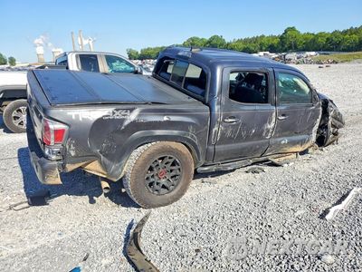 Trzecie zdjęcie samochodu z tyłu: 2020 TOYOTA TACOMA TRD OFF-ROAD VIN:3TMCZ5AN0LM313142 - miniatura