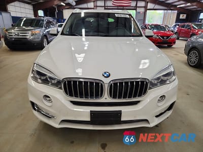Piąte zdjęcie samochodu w środku: 2016 BMW X5 XDRIVE35I VIN:5UXKR0C54G0P26703 - miniatura