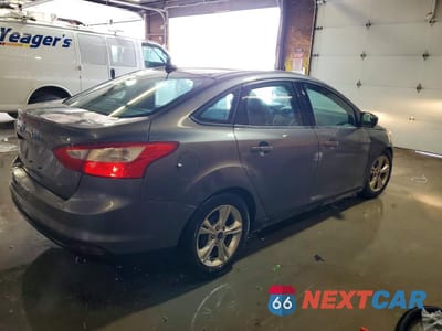 Trzecie zdjęcie samochodu z tyłu: 2014 FORD FOCUS SE VIN:1FADP3F29EL226766 - miniatura