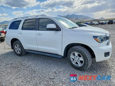 Czwarte zdjęcie samochodu z boku: 2018 TOYOTA SEQUOIA SR5 VIN:5TDBY5G13JS162135 - miniatura