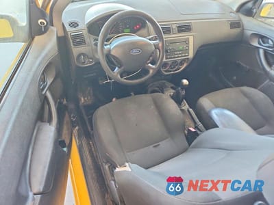 Zdjęcie 8 z 12 samochodu: 2007 FORD FOCUS ZX3 VIN:1FAFP31N77W260376 - miniatura
