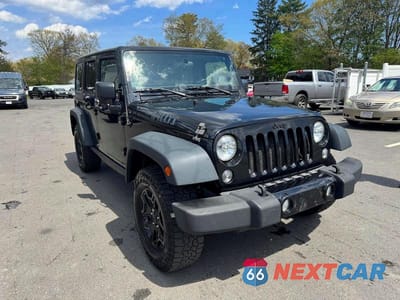 Czwarte zdjęcie samochodu z boku: 2015 JEEP WRANGLER UNLIMITED SPORT VIN:1C4BJWDG9FL542754 - miniatura