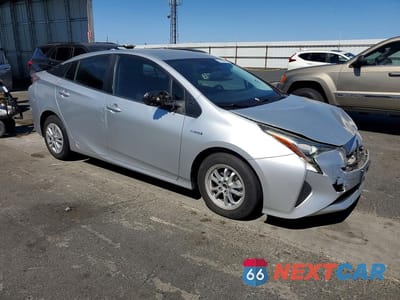Czwarte zdjęcie samochodu z boku: 2017 TOYOTA PRIUS ONE VIN:JTDKBRFUXH3044552 - miniatura