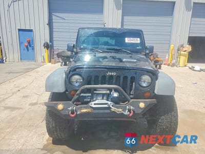 Piąte zdjęcie samochodu w środku: 2012 JEEP WRANGLER UNLIMITED SPORT VIN:1C4BJWDG6CL119190 - miniatura