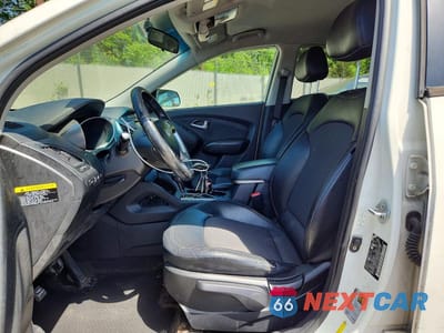 Zdjęcie 7 z 13 samochodu: 2012 HYUNDAI TUCSON GLS VIN:KM8JUCAC8CU336927 - miniatura
