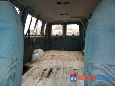 Zdjęcie 10 z 14 samochodu: 1995 FORD ECONOLINE E350 SUPER DUTY VIN:1FBJS31H8SHA40985 - miniatura