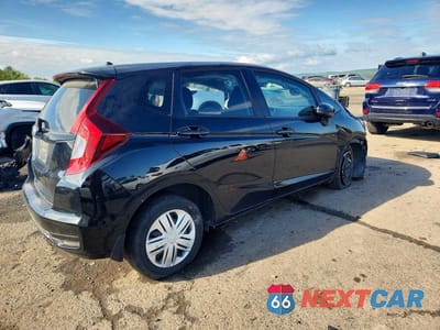 Trzecie zdjęcie samochodu z tyłu: 2020 HONDA FIT LX VIN:3HGGK5H41LM732850 - miniatura