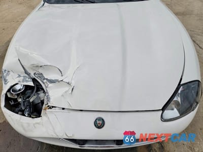 Zdjęcie 11 z 12 samochodu: 2006 JAGUAR XK8 VIN:SAJDA42CX62A45655 - miniatura