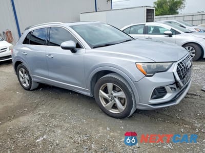 Czwarte zdjęcie samochodu z boku: 2019 AUDI Q3 PREMIUM VIN:WA1AECF31K1078383 - miniatura