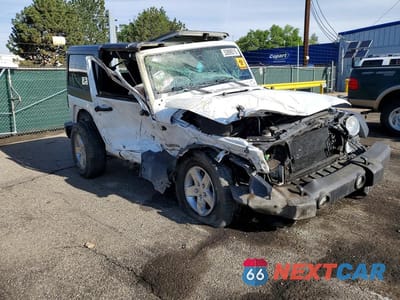 Czwarte zdjęcie samochodu z boku: 2018 JEEP WRANGLER SPORT VIN:1C4AJWAG7JL829941 - miniatura