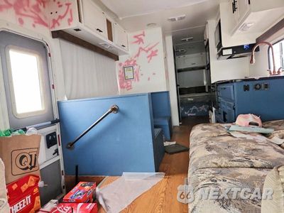 Zdjęcie 6 z 10 samochodu: 2000 FOUR WINDS RV VIN:1FDXE45S6YHA88787 - miniatura