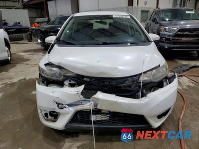 Piąte zdjęcie samochodu w środku: 2016 HONDA FIT LX VIN:JHMGK5H57GX025533 - miniatura