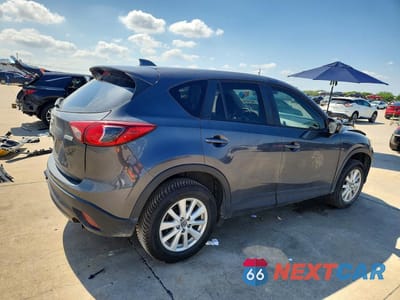 Trzecie zdjęcie samochodu z tyłu: 2014 MAZDA CX-5 TOURING VIN:JM3KE2CYXE0319766 - miniatura