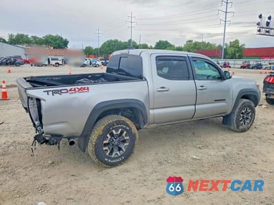 Trzecie zdjęcie samochodu z tyłu: 2023 TOYOTA TACOMA TRD OFF-ROAD VIN:3TMCZ5AN3PM597162 - miniatura