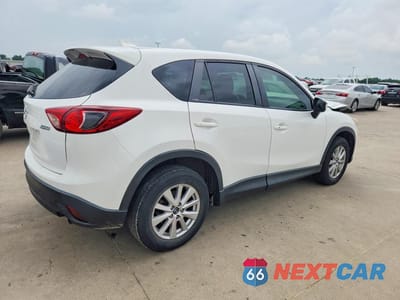 Trzecie zdjęcie samochodu z tyłu: 2016 MAZDA CX-5 TOURING VIN:JM3KE2CY9G0660711 - miniatura