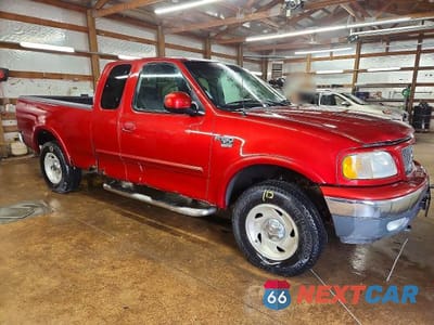 Czwarte zdjęcie samochodu z boku: 2001 FORD F150 VIN:1FTRX18L11NB36620 - miniatura