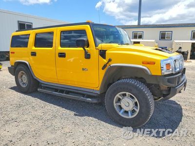 Czwarte zdjęcie samochodu z boku: 2005 HUMMER H2 VIN:5GRGN23U65H129183 - miniatura