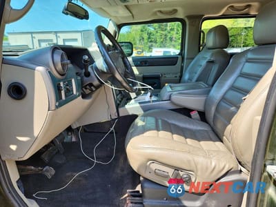 Zdjęcie 7 z 13 samochodu: 2003 HUMMER H2 VIN:5GRGN23U83H145186 - miniatura