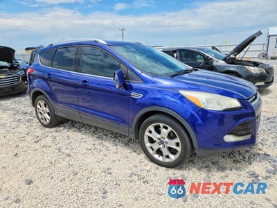 Czwarte zdjęcie samochodu z boku: 2014 FORD ESCAPE TITANIUM VIN:1FMCU9J92EUC86481 - miniatura
