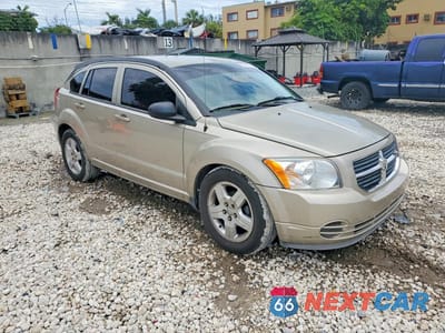Czwarte zdjęcie samochodu z boku: 2009 DODGE CALIBER SXT VIN:1B3HB48A59D198387 - miniatura