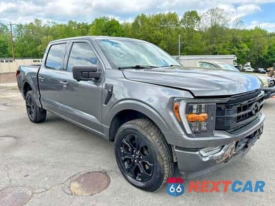 Czwarte zdjęcie samochodu z boku: 2023 FORD F150 SUPERCREW VIN:1FTFW1E81PFA95091 - miniatura