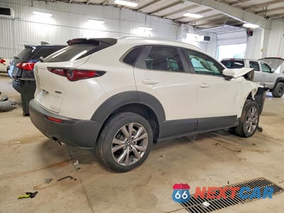 Trzecie zdjęcie samochodu z tyłu: 2022 MAZDA CX-30 SELECT VIN:3MVDMBBL1NM423634 - miniatura