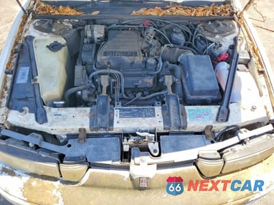 Zdjęcie 11 z 12 samochodu: 1992 OLDSMOBILE CUTLASS SUPREME S VIN:1G3WH54T1ND336907 - miniatura