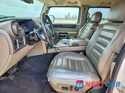 Zdjęcie 7 z 12 samochodu: 2003 HUMMER H2 VIN:5GRGN23U53H122951 - miniatura