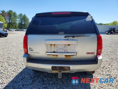 Zdjęcie 6 z 12 samochodu: 2011 GMC YUKON SLE VIN:1GKS2AE00BR267613 - miniatura