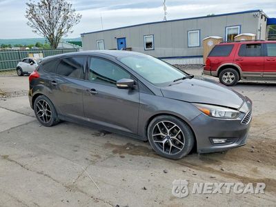 Czwarte zdjęcie samochodu z boku: 2018 FORD FOCUS SEL VIN:1FADP3M27JL233857 - miniatura