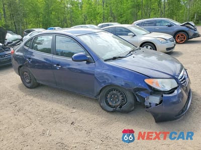 Czwarte zdjęcie samochodu z boku: 2010 HYUNDAI ELANTRA BLUE VIN:KMHDU4BD7AU977574 - miniatura
