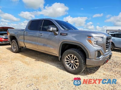 Czwarte zdjęcie samochodu z boku: 2022 GMC SIERRA LIMITED K1500 AT4 VIN:1GTP9EELXNZ175024 - miniatura