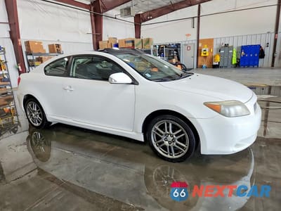 Czwarte zdjęcie samochodu z boku: 2005 SCION TC BASE VIN:JTKDE177050016596 - miniatura
