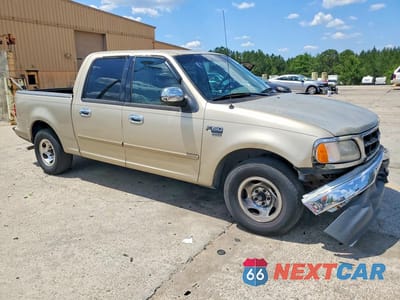 Czwarte zdjęcie samochodu z boku: 2001 FORD F150 SUPERCREW VIN:1FTRW07WX1KE16577 - miniatura