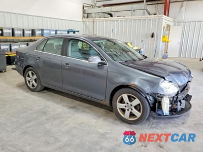 Czwarte zdjęcie samochodu z boku: 2009 VOLKSWAGEN JETTA SE VIN:3VWRZ71K19M092135 - miniatura