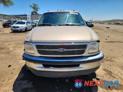 Piąte zdjęcie samochodu w środku: 1998 FORD F150 VIN:1FTRX17L7WKA76854 - miniatura