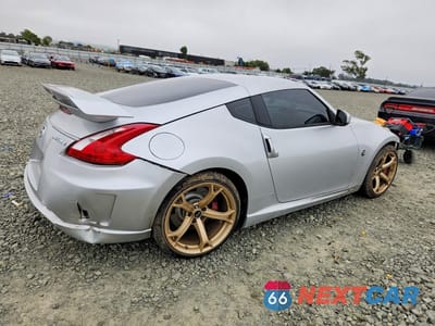 Trzecie zdjęcie samochodu z tyłu: 2012 NISSAN 370Z BASE VIN:JN1AZ4EH2CM561333 - miniatura
