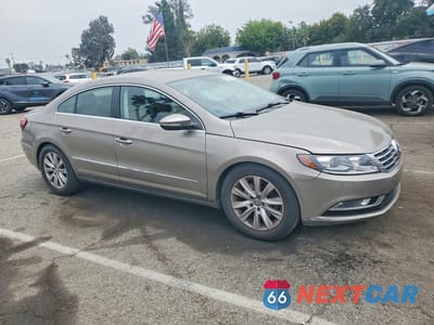 Czwarte zdjęcie samochodu z boku: 2014 VOLKSWAGEN CC SPORT VIN:WVWBP7AN2EE515650 - miniatura