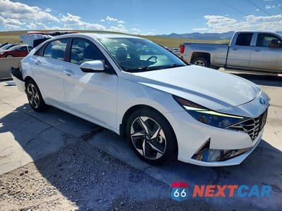 Czwarte zdjęcie samochodu z boku: 2022 HYUNDAI ELANTRA SEL VIN:5NPLN4AG0NH066642 - miniatura