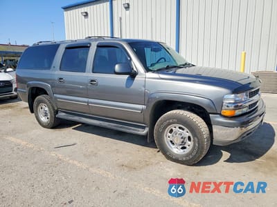 Czwarte zdjęcie samochodu z boku: 2001 CHEVROLET SUBURBAN K2500 VIN:3GNGK26G11G159185 - miniatura